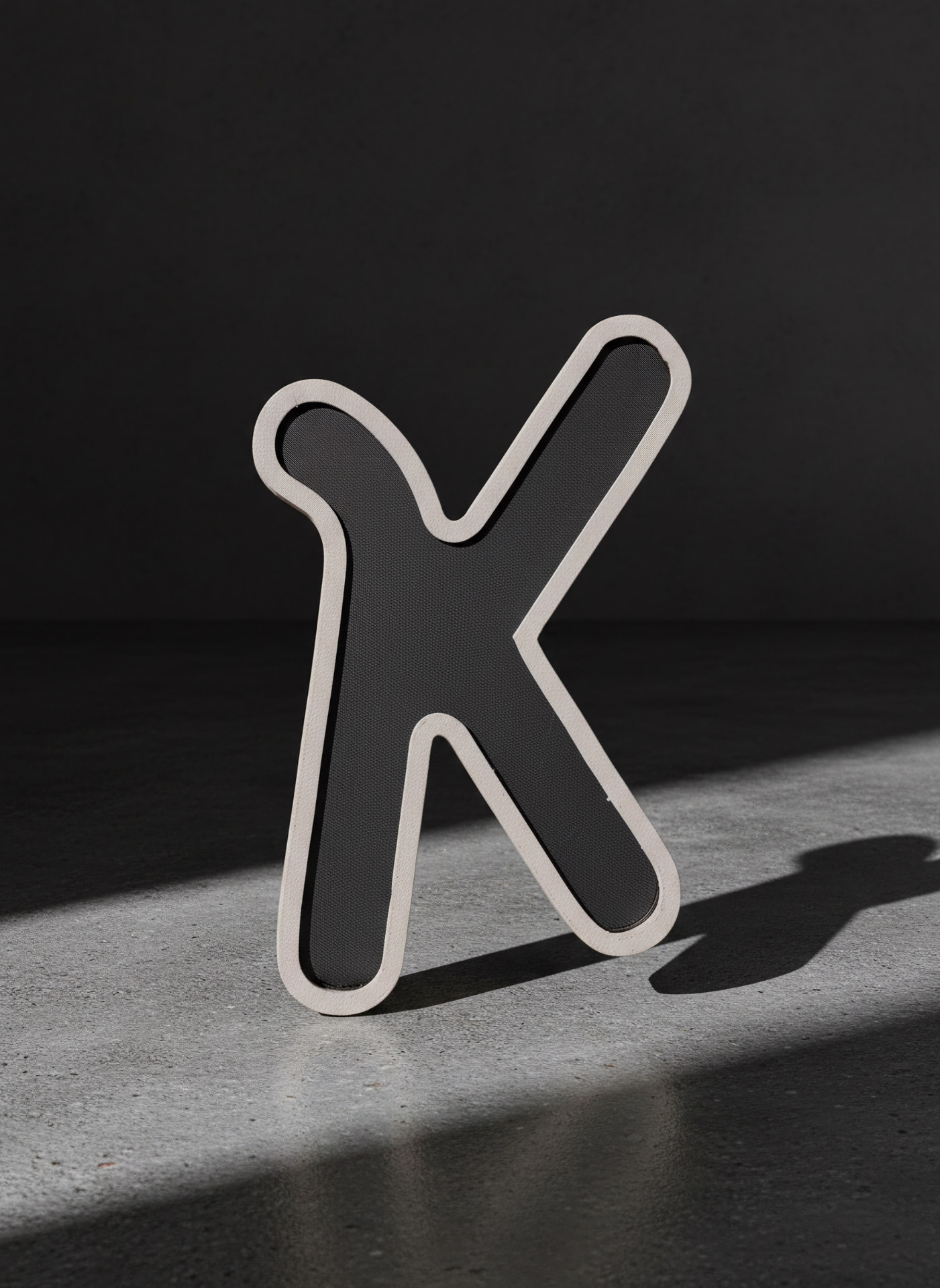 Lettera K grigia — versione illuminabile